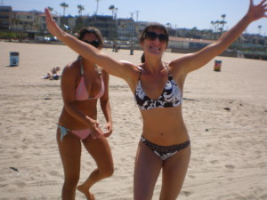 Krista and Shayne frolicking on Manhattan Beach